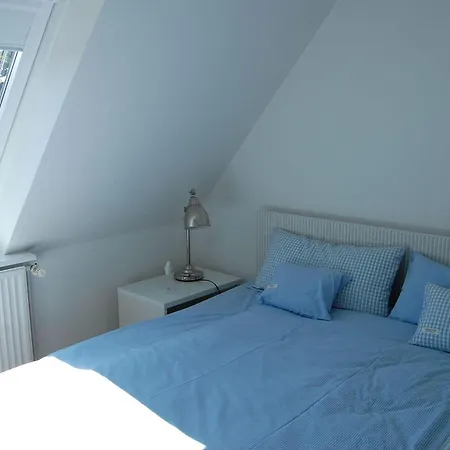 Schoenes-wohnen-am-suedstrand-fewo-7 Apartmán *